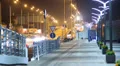 Pavement people walking night in city sidewalk cars driving road HD Footage