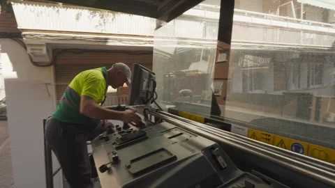 Pavement recycling, onboard view of qualified worker driving milling machine 스톡 동영상 253233306