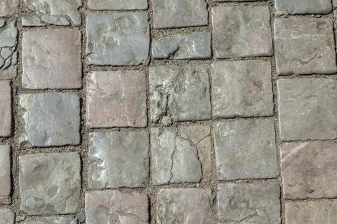 Pavement with square stone blocks, texture Stock Photos
