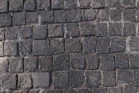 Pavement texture. Old paving stone mosaic pattern Stock Photos