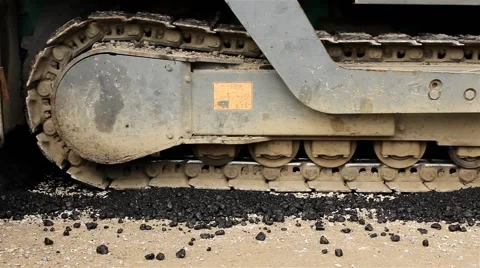 Paver machine during road construction. Tracked machine. Asphalt.Paving.Close up Stock Footage 41729498