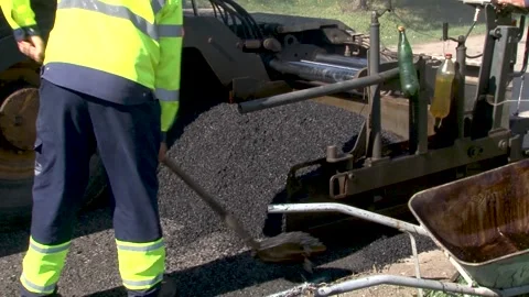 Paver or paving machine lay bitumen. Video stock 234208366