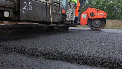 The paver is in the process of work. Video stock 199245025