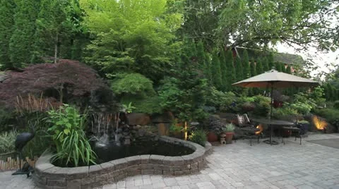 Paver Stone Garden Backyard Waterfall with Furniture and Umbrella 1080p 스톡 동영상 11747283