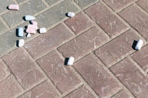 The pavers are multi-colored crayons for drawing. Stock Photos
