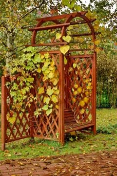 Pavilion with bench at paving pathway Stock Photos