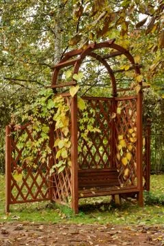 Pavilion with bench at paving pathway Stock Photos