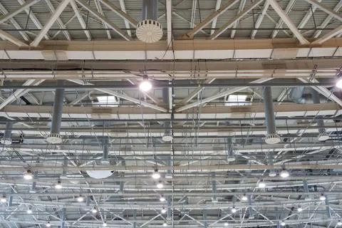Pavilion ceiling with lights on, inside the building Stock Photos