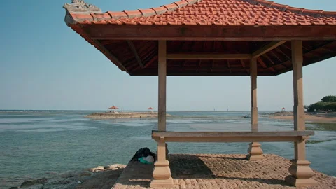 Pavilion framing calm sea view , Karang Beach, Bali Видео 336514816