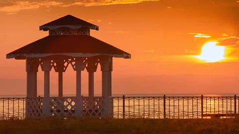 Pavilion by the lake at sunset Stock Footage 98764327