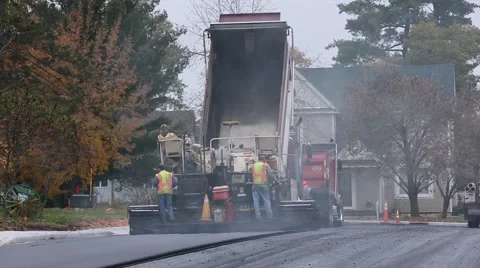 PAVING  ASPHALT CONSTRUCTION WORKERS Stock Footage 42823310