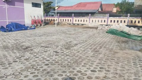 Paving block installation project on a wide schoolyard or courtyard Stock Photos