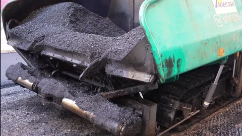 Paving machine in action closing wings to recollect hot mix asphalt 스톡 동영상 253230862