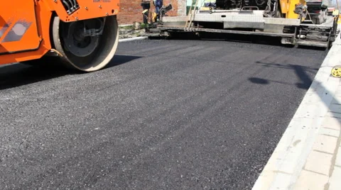 Paving Machine asphalt bitumen road  Stock Footage 61792674