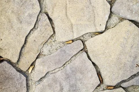 Paving of a path under a light natural stone Stock Photos