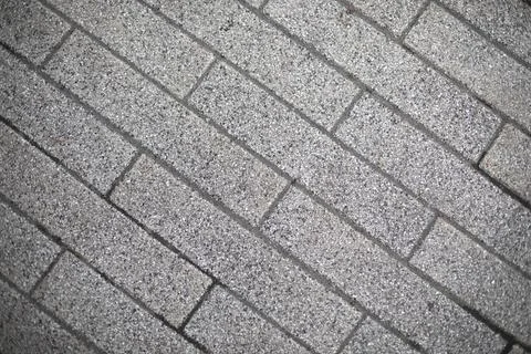 Paving slabs texture. Road surface. Stock Photos