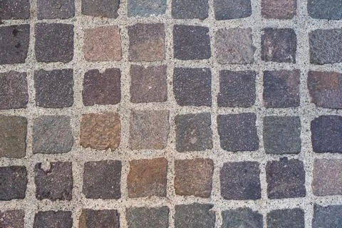 Paving with squared stone blocks Stock Photos