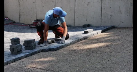Paving Stone Installation in Backyard Garden During Summer Afternoon Stock-Footage 281242037