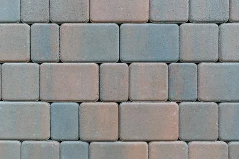 Paving stones are rectangular and square with rounded corners. Stock Photos