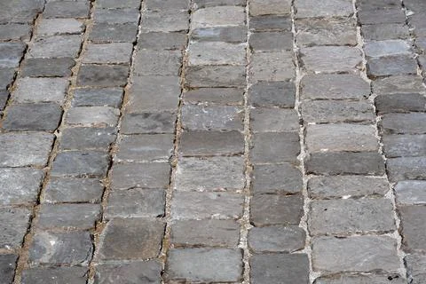 Paving stones in geometric pattern for use as a background texture Stock Photos