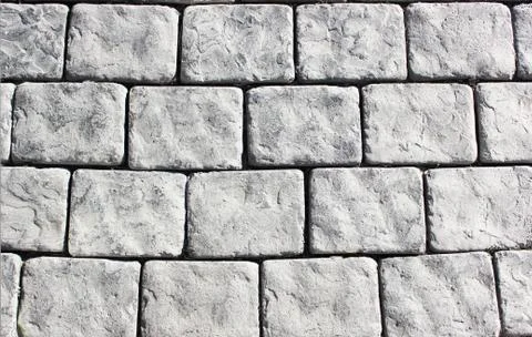 Paving stones, texture background old stones, gray large bricks, on the street Stock Photos