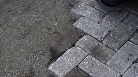 Paviour laying bricks close-up Video stock 62197945