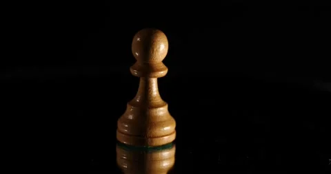 Pawn chess piece rotating isolated on black mirror reflection Stock Footage 218644226