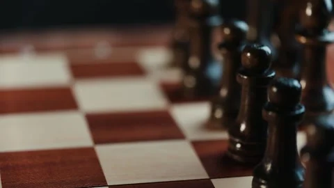 A pawn move in a chess game close up Stock Footage 130994226