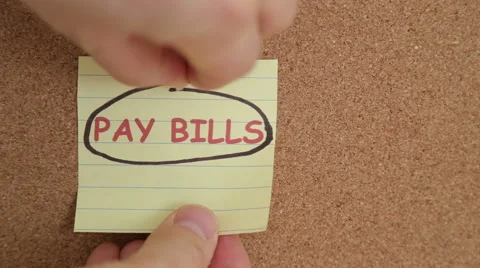 Pay bills note on a bulletin board Stock Footage 45908739