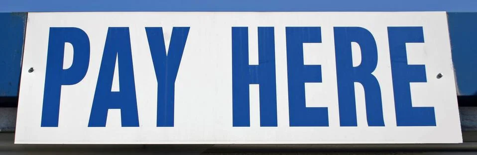 Pay Here Stock Photos