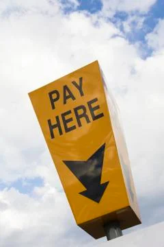 Pay here sign Stock Photos