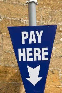 Pay Here Sign Stock Photos