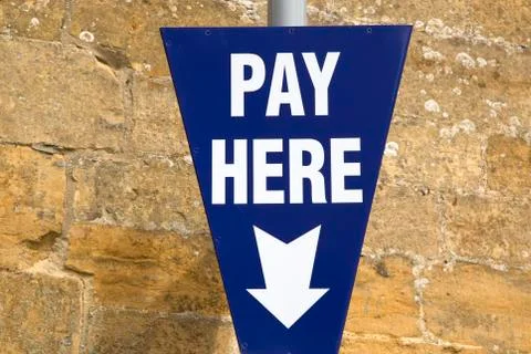 Pay Here Sign Stock Photos