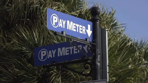 Pay meter sign blowing in wind 4k Stock Footage 127197856