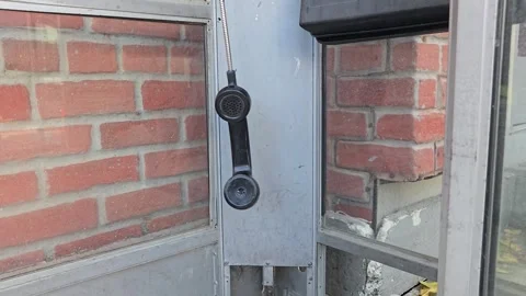 Pay Phone dangling back and forth Stock-Footage 317065446