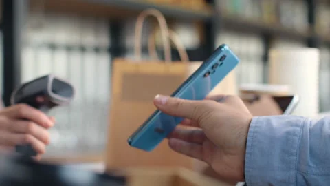 Pay by qr code on phone screen at coffee bar. Qr reader scans electronic card to Video stock 199485793