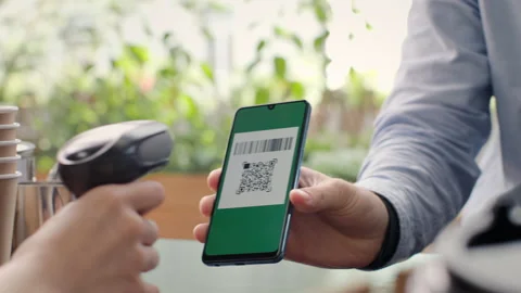 Pay by qr code on phone screen at coffee bar. Qr reader scans electronic card to Stock Footage 199485976