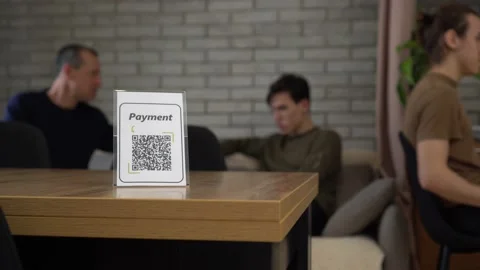 Pay touch-free with a QR code. Contactless Payment for Restaurant. Scanning Stock Footage 148535586