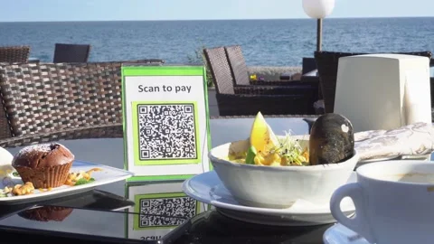 Pay touch-free with a QR code. QR code scanning app. Touchless digital payment Stock Footage 170412011