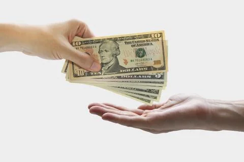 Pay the US dollar , Hand use dollar money on the white background Stock Photos