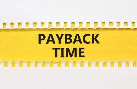 Payback time symbol. Concept words Payback time on yellow paper. Beautiful .. Stockfoto's