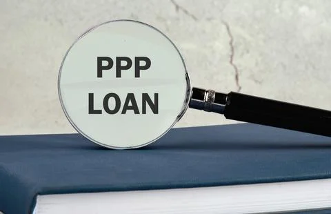 Paycheck Protection Program PPP Loan written on a gray background through a m Foto stock
