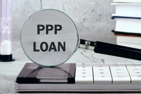 Paycheck Protection Program PPP Loan written on the background through a ma.. 스톡 사진