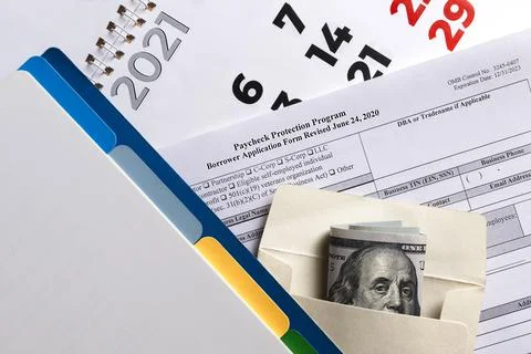 Paycheck protection program second draw. borrower application form revised. Stock Photos