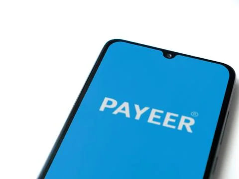 PAYEER app launch screen on smartphone on white background Stock Photos