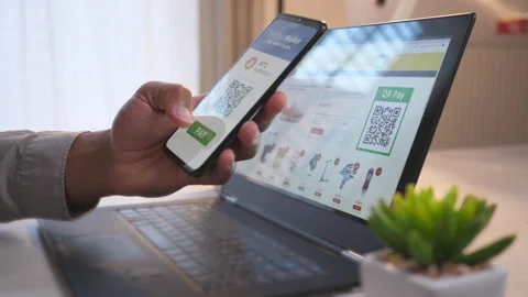 Paying with bitcoins via a mobile app Stock Footage 154003360