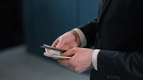 Paying the debt with dollars Stock Footage 104601511