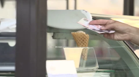 Paying for an icecream in slow motion Stock Footage 54915537