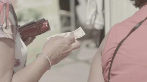 Paying at a market Video stock 39093179