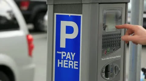 Paying a parking meter Stock Footage 10920760